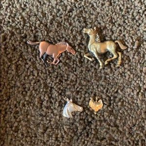 2 pins on top, two charms on bottom.